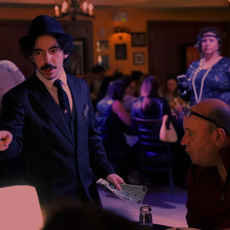 A detective questioning a guest at a San Antonio show