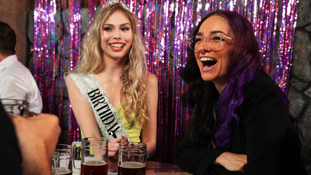 Guests celebrating at a San Antonio murder mystery party